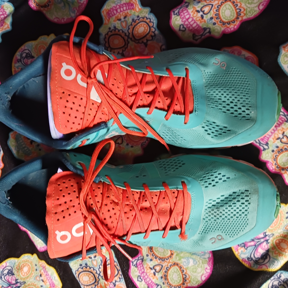 On Running Teal and Red Athletic Shoes